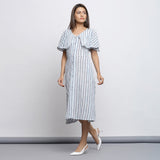 Front View of a Model wearing Crinkled 100% Cotton Striped Button-Down Midi Cape Dress