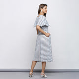Back View of a Model wearing Crinkled 100% Cotton Striped Button-Down Midi Cape Dress