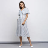 Front View of a Model wearing Crinkled 100% Cotton Striped Button-Down Midi Cape Dress
