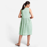 Back View of a Model wearing Yarn Dyed Cotton Aqua Yoke Dress