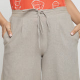 Front Detail of a Model wearing Beige Yarn Dyed 100% Cotton Elasticated Paneled Pegged Pant
