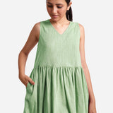 Front Detail of a Model wearing Yarn Dyed Cotton Green Yoke Dress