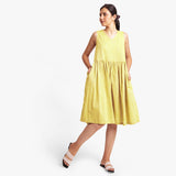 Front View of a Model wearing Yarn Dyed Cotton Lemon Yellow Yoke Dress