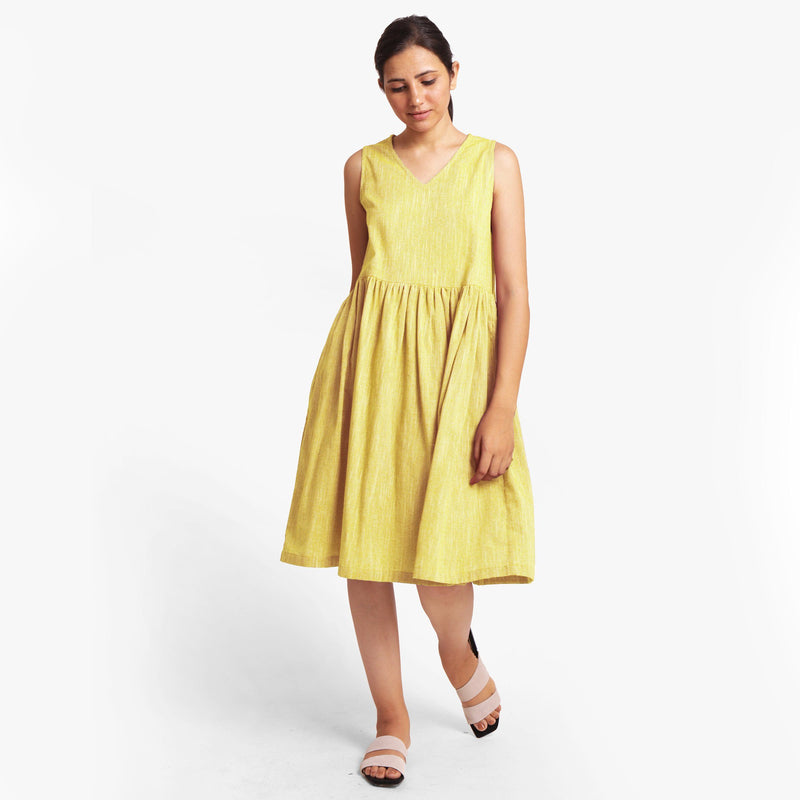 Front View of a Model wearing Yarn Dyed Cotton Lemon Yellow Yoke Dress