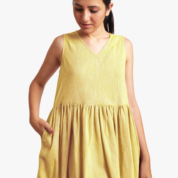 Front Detail of a Model wearing Yarn Dyed Cotton Lemon Yellow Yoke Dress