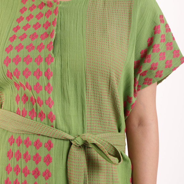 Front Detail of a Model wearing Green Crinkled Cotton Striped A-Line Dress