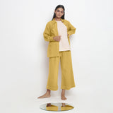 Front View of a Model wearing Yellow 100% Cotton Button-Down Outerwear