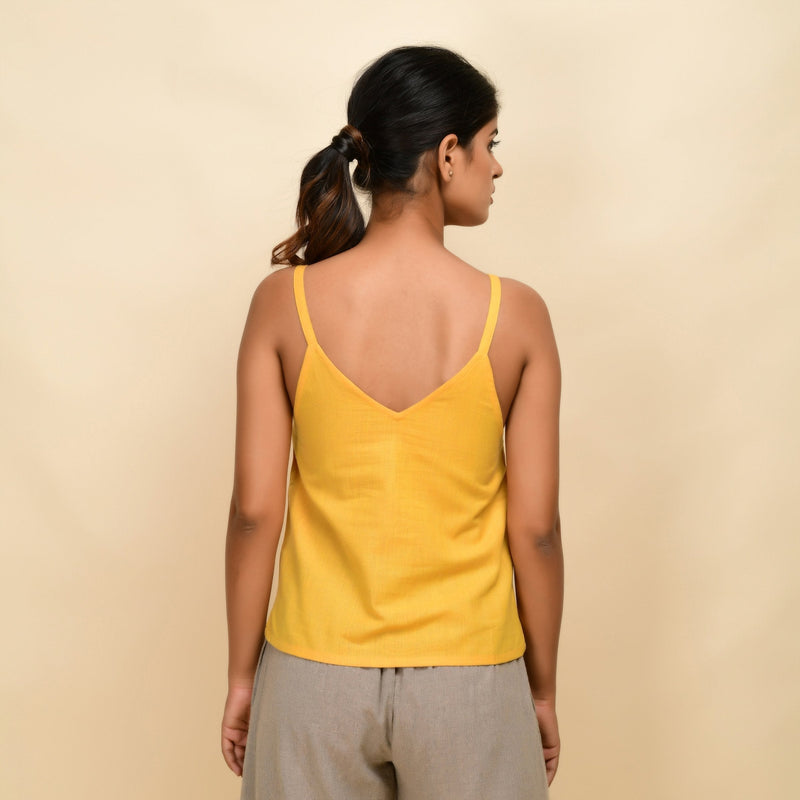 Back View of a Model wearing Yellow Yarn Dyed Handspun Cotton Round Neck Spaghetti Top