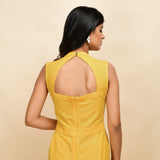 Back Detail of a Model wearing Yellow Cotton Khadi Sleeveless Jumpsuit