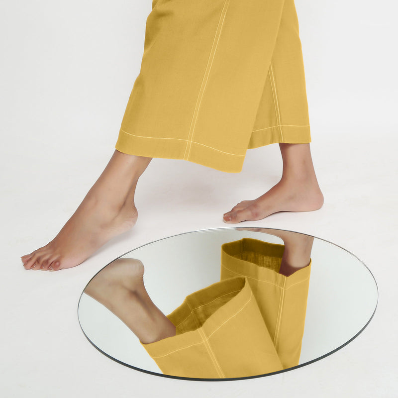 Close View of a Model wearing Light Yellow Vegetable Dyed Wide Legged Pant