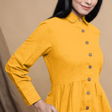 Front Detail of a Model wearing Yellow Button Down Cotton Flax Knee Length Formal Dress