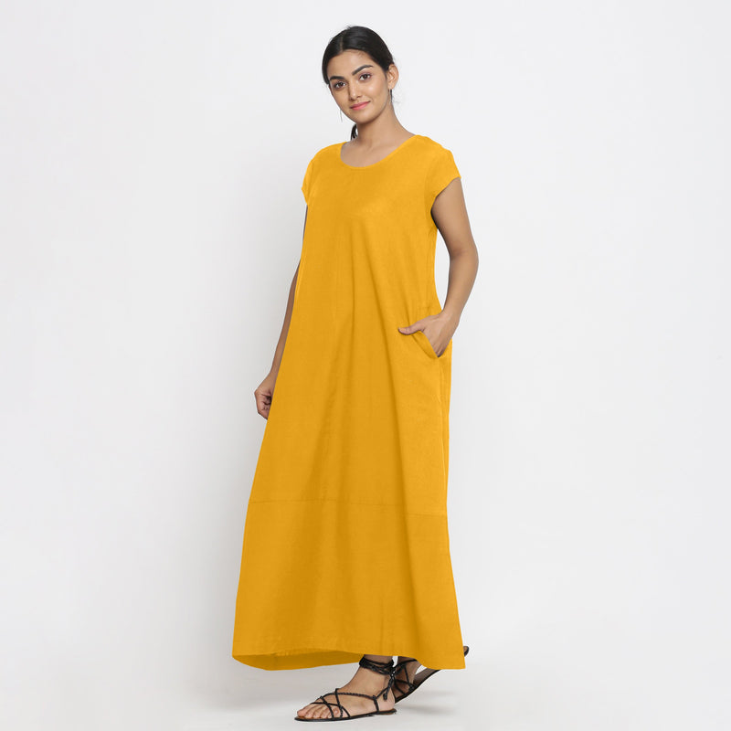 Left View of a Model wearing Yellow Cotton Flax A-Line Paneled Dress