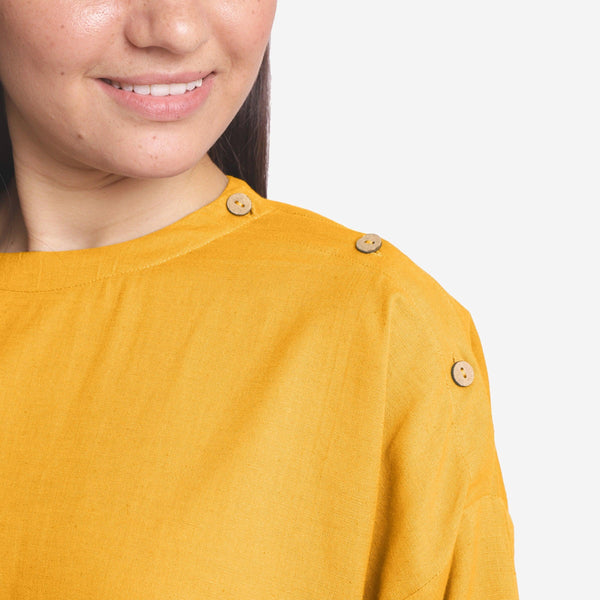 Front Detail of a Model wearing Yellow Cotton Flax Flared A-Line Top