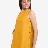 Front Detail of a Model wearing Yellow Cotton Flax Kangaroo Pocket Dress
