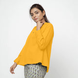 Left View of a Model wearing Yellow Cotton Flax Straight Yoked Top