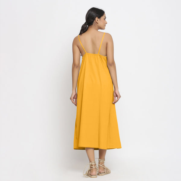 Back View of a Model wearing Yellow Cotton Flax Strap Sleeve A-Line Dress