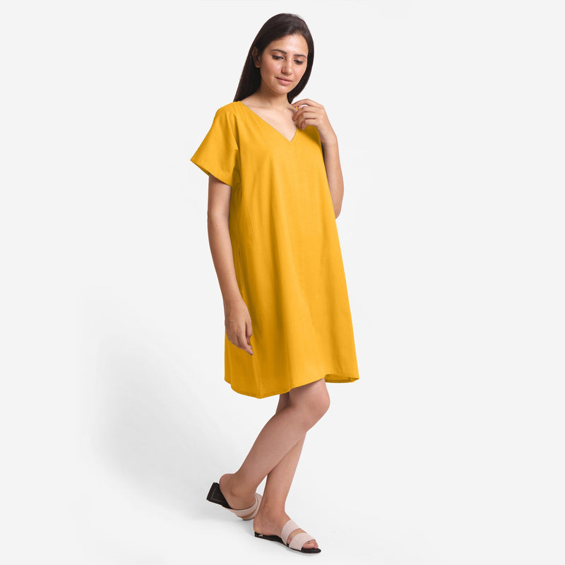 Right View of a Model wearing Yellow Cotton Flax V-Neck Tunic