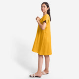 Left View of a Model wearing Yellow Cotton Flax V-Neck Tunic