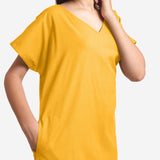 Front Detail of a Model wearing Yellow Cotton Flax V-Neck Tunic