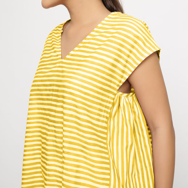 Left Detail of a Model wearing Yellow Hand Screen Printed 100% Cotton Top