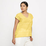 Right View of a Model wearing Yellow Hand Screen Printed 100% Cotton Top
