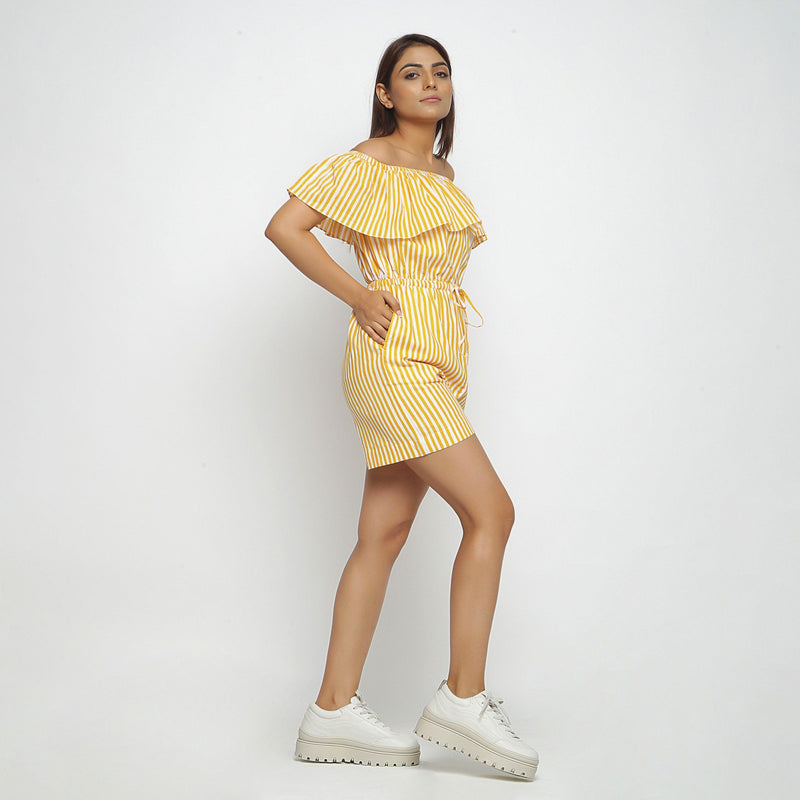 Left View of a Model wearing Yellow Hand-Screen Print Playsuit