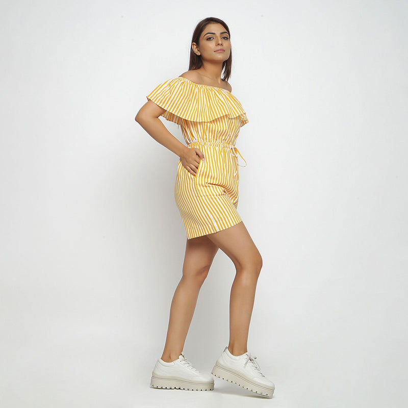 Right View of a Model wearing Yellow Hand-Screen Print Playsuit
