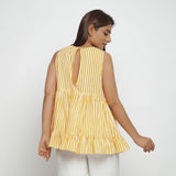 Back View of a Model wearing Yellow Tiered Hand Screen Printed Top