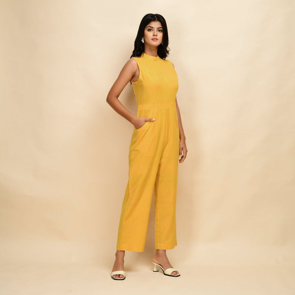 Right View of a Model wearing Yellow Handspun Cotton Princess Line Sleeveless Jumpsuit
