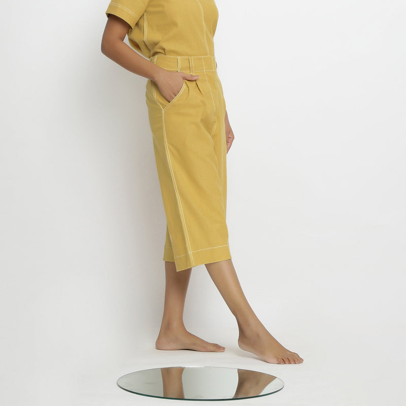 Right View of a Model wearing Yellow Vegetable Dyed Handspun Cotton Mid-Rise Culottes