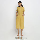 Front View of a Model wearing Yellow Vegetable Dyed Handspun Cotton Mid-Rise Culottes