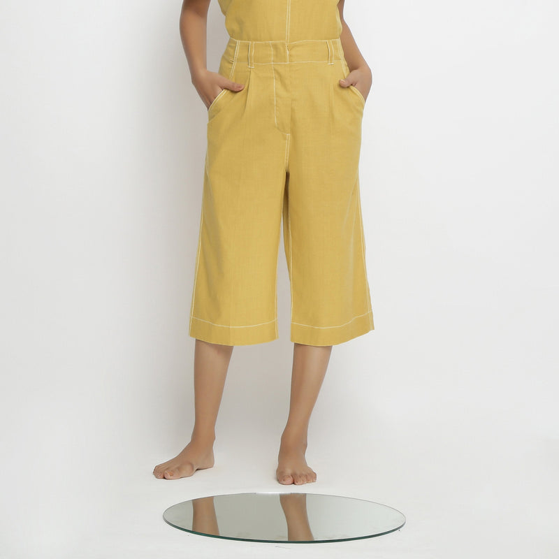 Front Detail of a Model wearing Yellow Mid Rise Vegetable Dyed Culottes