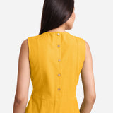 Back Detail of a Model wearing Yellow Patch Pocket Round Neck Dress