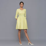 Front View of a Model wearing Yellow Pistachio V-Neck Corduroy Dress