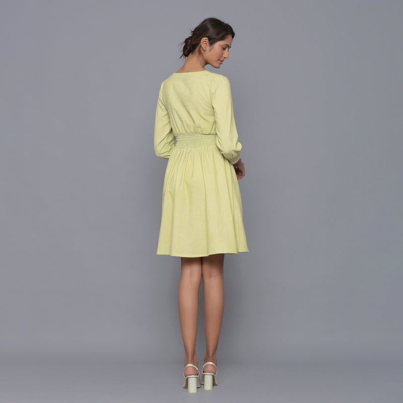 Back View of a Model wearing Yellow Pistachio V-Neck Corduroy Dress