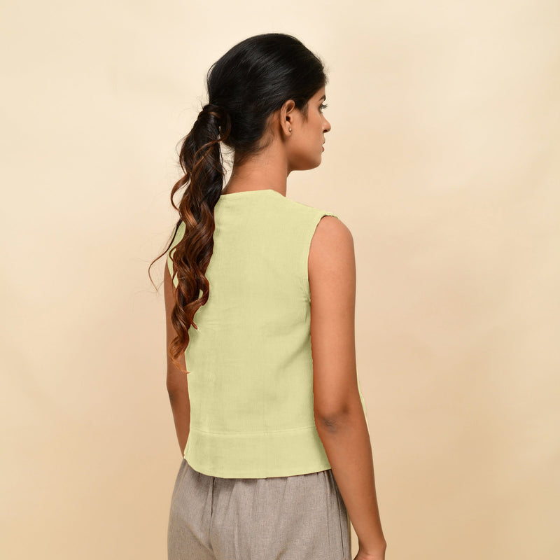 Back View of a Model wearing Yellow Corduroy Button-Down Short Top