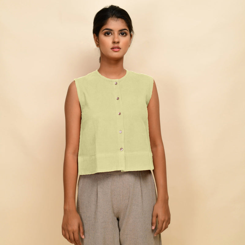Front View of a Model wearing Yellow Corduroy Button-Down Short Top