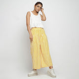 Front View of a Model wearing Yellow Striped Wide Legged Cotton Pant