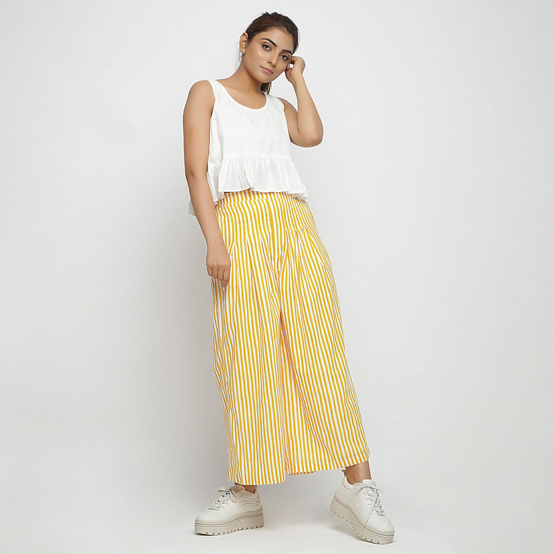 Front View of a Model wearing Yellow Striped Wide Legged Cotton Pant