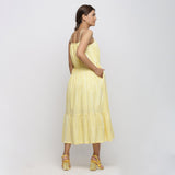 Back View of a Model wearing Yellow Hand Tie-Dye Cotton Midi Tiered Dress