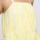 Front Detail of a Model wearing Yellow Hand Tie-Dye Cotton Midi Tiered Dress