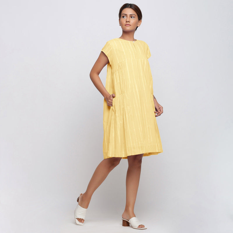 Right View of a Model wearing Yellow Tie Dye Yoked Knee Length Dress