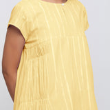 Front Detail of a Model wearing Yellow Tie Dye Yoked Knee Length Dress