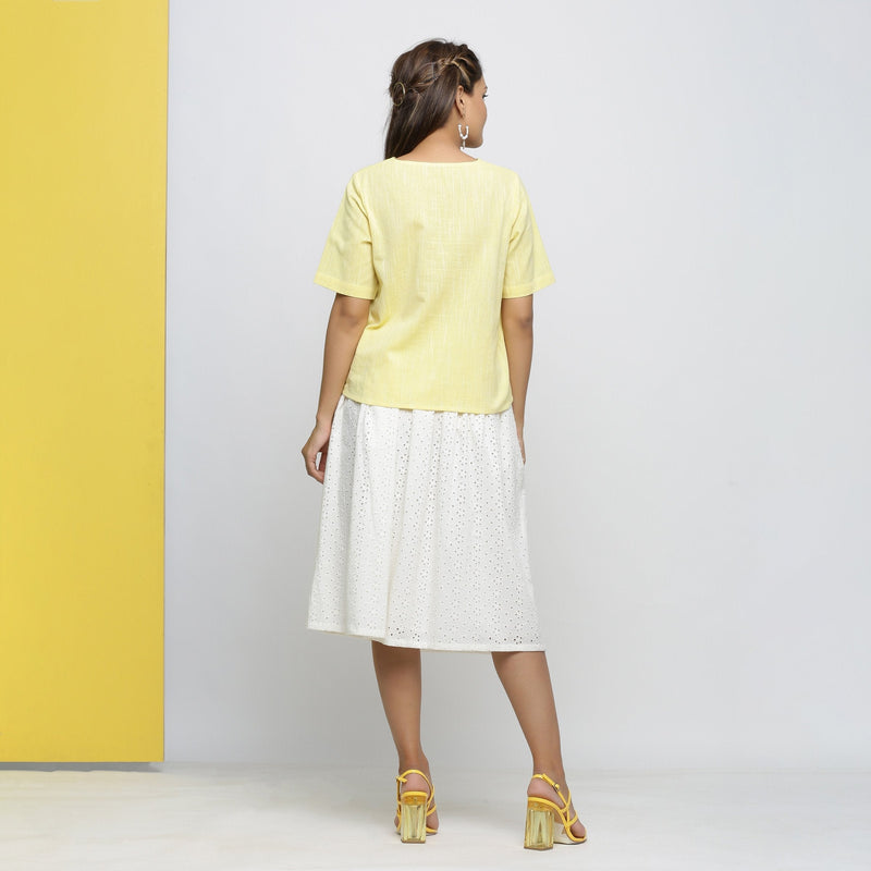 Back View of a Model wearing Yellow Yarn Dyed Cotton V-Neck High-Low Top