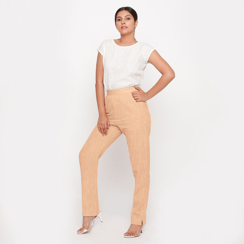 Front View of a Model wearing Yellow Yarn Dyed Mid Rise Tapered Pant